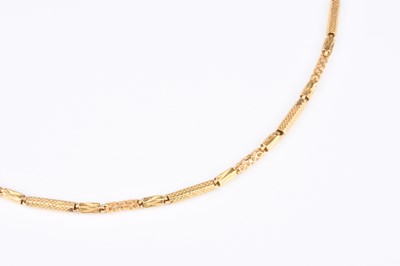 Lot 199 - A yellow metal necklace