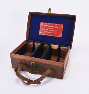 Lot 17 - An Army & Navy leather ammunition case