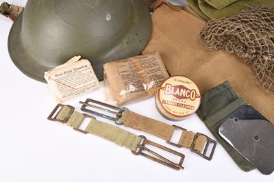 Lot 64 - MkII British Army helmet with webbing and other items