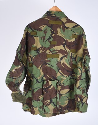 Lot 65 - A group of military-related badges together with a post-war DPM British Army sniper's smock