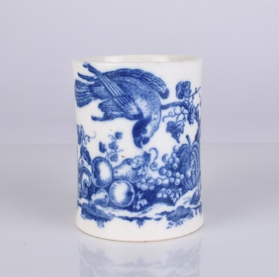 Lot 439 - A small Caughley 'Parrot Pecking Fruit' mug, circa 1780-85