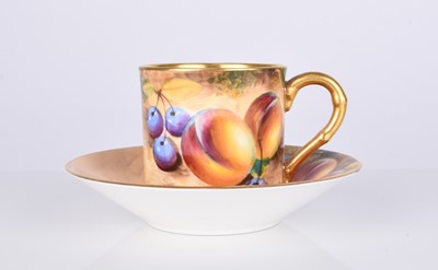 Lot 557 - Royal Worcester coffee can and saucer decorated with fruit by Roberts