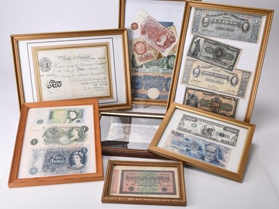 Lot 305 - Three albums of UK and foreign banknotes together with seven framed banknotes
