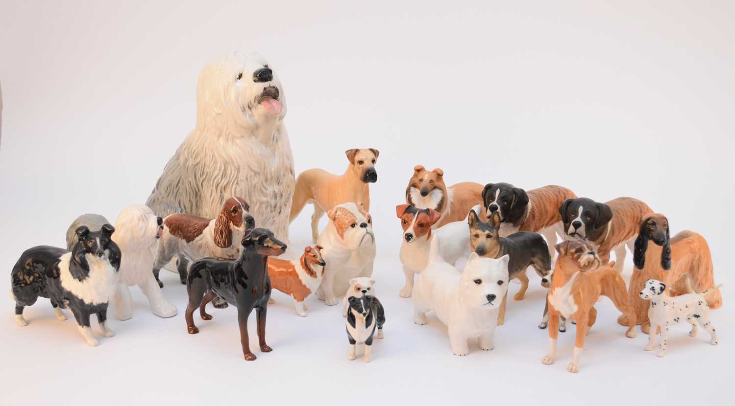 Lot 561 - A collection of Beswick models of dogs