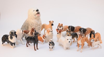 Lot 561 - A collection of Beswick models of dogs