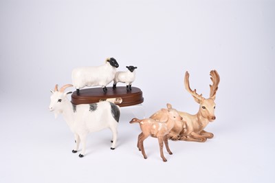 Lot 566 - A small group of Beswick animals including sheep and deer