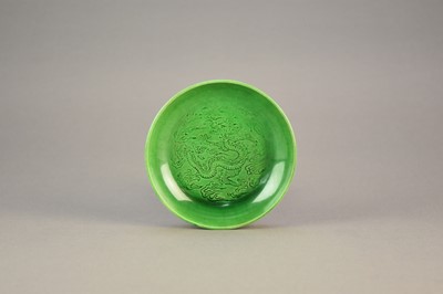 Lot 16 - A Chinese Langyao type green glazed dragon dish, probably Kangxi