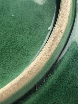 Lot 16 - A Chinese Langyao type green glazed dragon dish, probably Kangxi