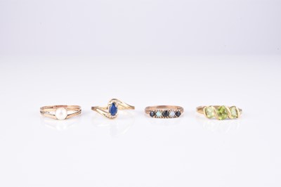 Lot 224 - A collection of four 9ct gold stone set rings