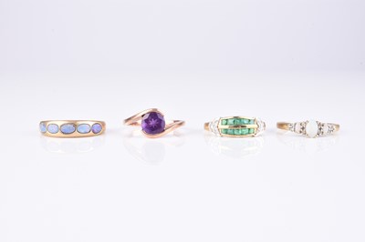 Lot 259 - A collection of four 9ct gold stone set rings