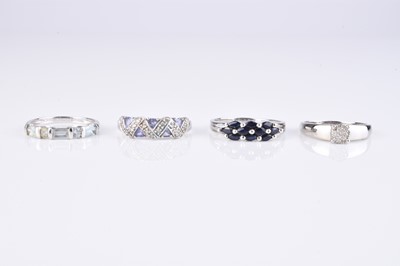 Lot 97 - A collection of four 9ct white gold stone set rings