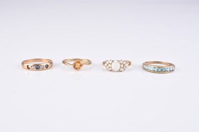 Lot 116 - A collection of four 9ct gold stone set rings