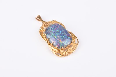 Lot 134 - An opal doublet pendant