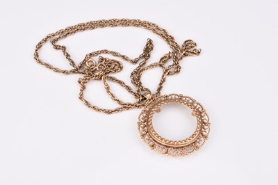 Lot 198 - A 9ct gold vacant sovereign pendant mount and chain