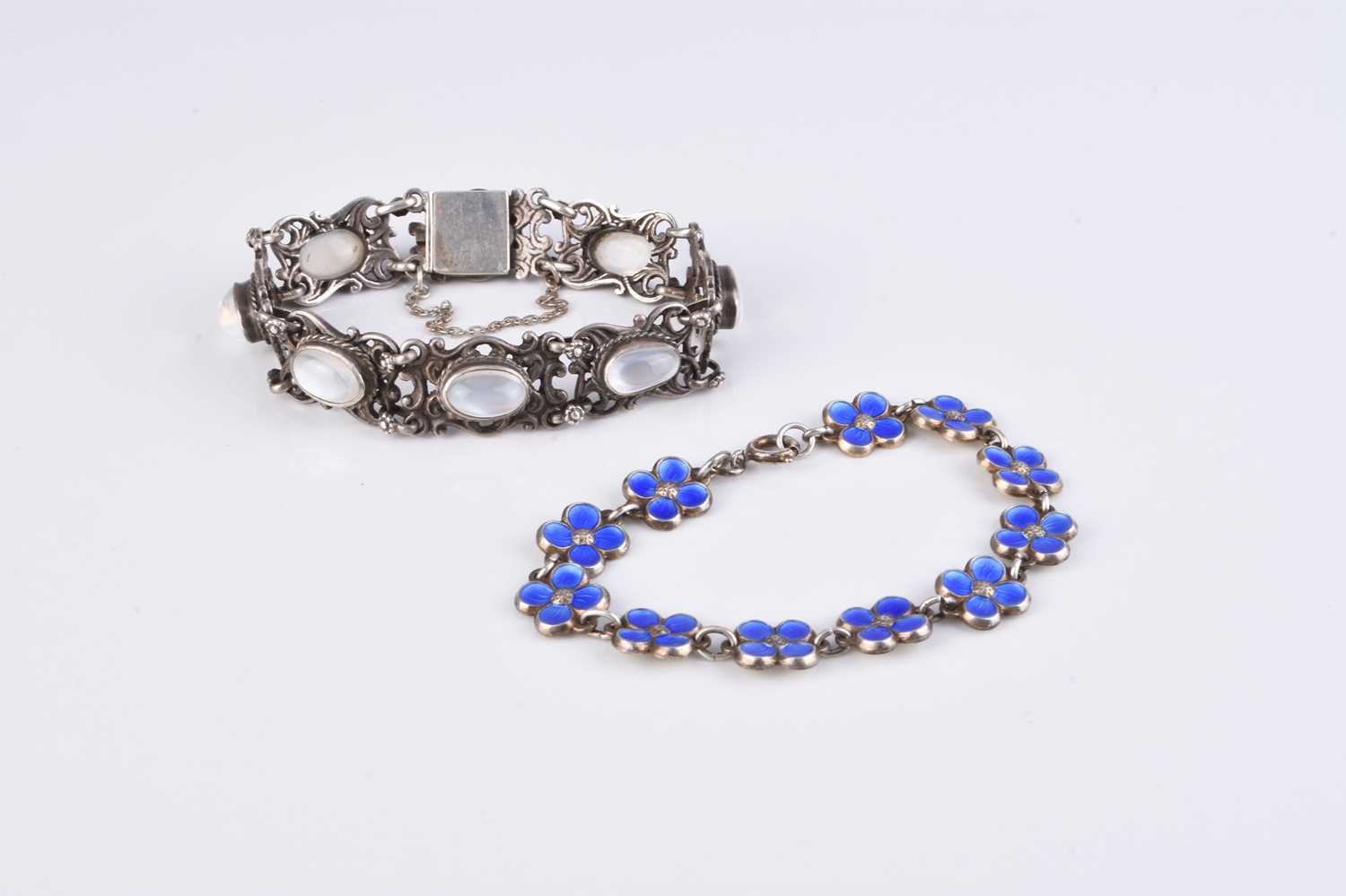 Lot 95 - A David Andersen Norwegian silver and enamel floral bracelet and a moonstone bracelet