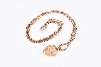Lot 145 - A yellow metal heart shaped pendant on chain