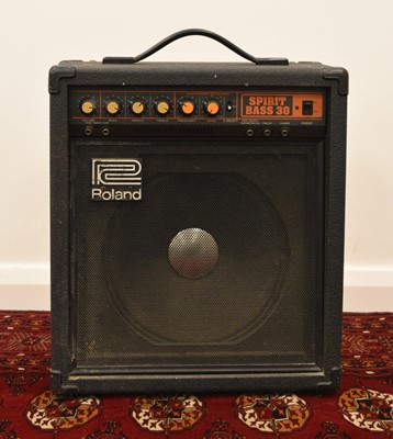 Lot 225 - An Ibanez electric bass guitar with Roland Spirit Bass 30 amplifier
