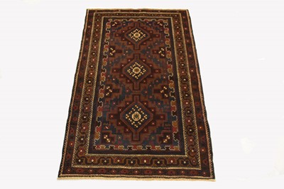 Lot 410 - A Balluchi tribal rug, Afghanistan