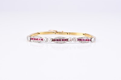 Lot 257 - An early 20th century diamond and ruby bracelet