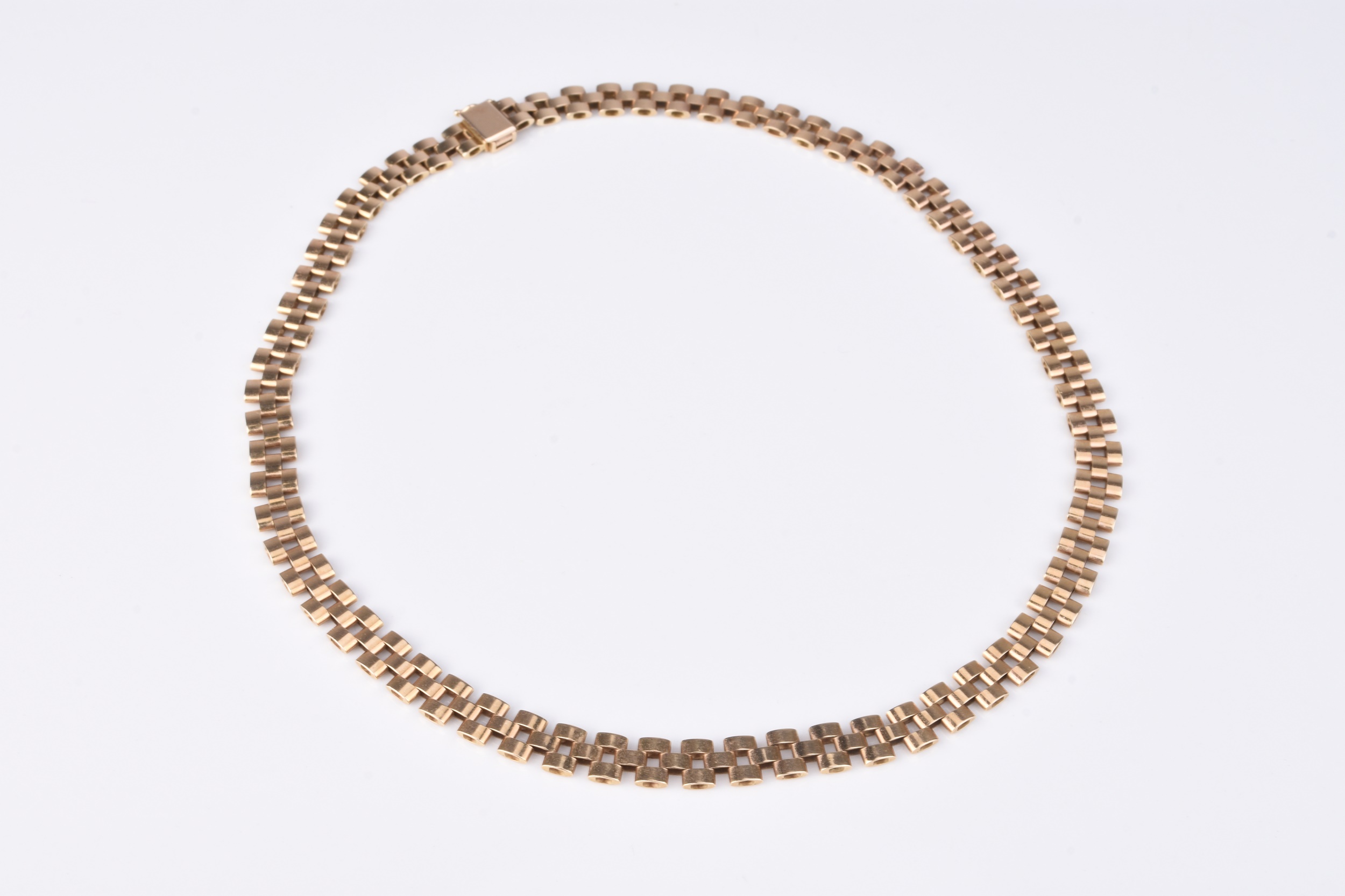 Lot 191 - A 9ct yellow gold three bar brick link chain