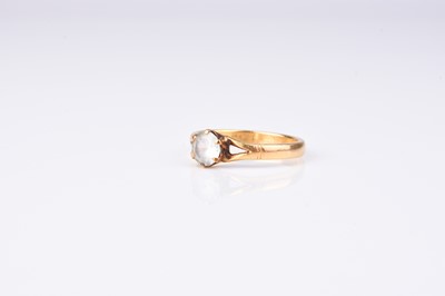 Lot 179 - A 22ct gold ring set with single faceted white paste