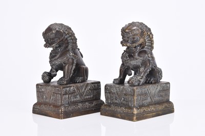 Lot 201 - A pair of Chinese bronze guardian lions