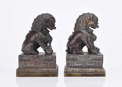 Lot 201 - A pair of Chinese bronze guardian lions
