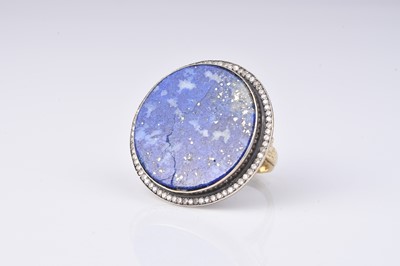 Lot 129 - An Egyptian lapis lazuli and diamond ring