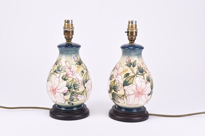 Lot 47 - A pair of Moorcroft 'Hibiscus Moon' table lamps, 21st century