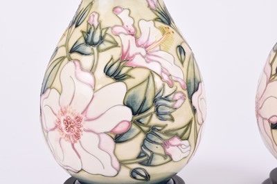 Lot 47 - A pair of Moorcroft 'Hibiscus Moon' table lamps, 21st century
