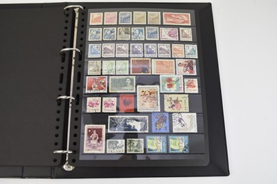 Lot 347 - A massive collection of all world stamps and some covers housed in 15 albums and a chocolate box.