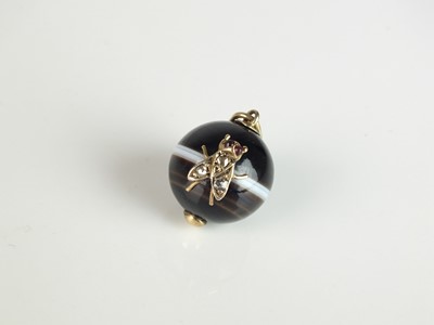 Lot 155 - A Victorian rose cut diamond and polished banded agate bead pendant