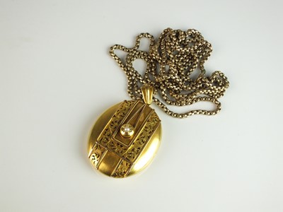 Lot 163 - A Victorian and split pearl oval locket