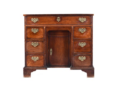 Lot 47 - George III mahogany kneehole desk