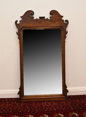 Lot 194 - A Georgian style mahogany fret type wall mirror