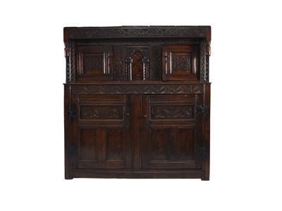 Lot 85 - A 17th century and later English oak court cupboard