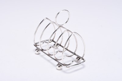 Lot 85 - A collection of five silver toast racks
