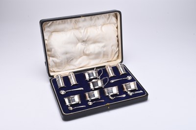 Lot 11 - A cased matched set of ten silver cruets