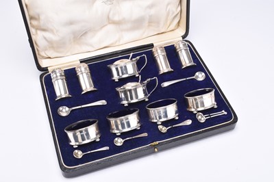 Lot 11 - A cased matched set of ten silver cruets
