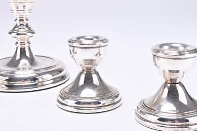 Lot 9 - Two pairs of silver candlesticks