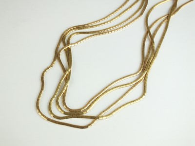 Lot 191 - A yellow metal multi-strand necklace