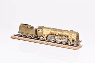 Lot 194 - A brass kit built OO gauge locomotive and tender, with track stand