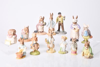 Lot 51 - A group of Beswick figures including Beatrix Potter