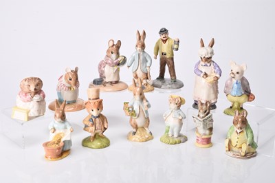 Lot 51 - A group of Beswick figures including Beatrix Potter