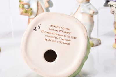 Lot 51 - A group of Beswick figures including Beatrix Potter