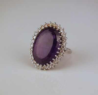 Lot 177 - An amethyst and diamond cluster ring