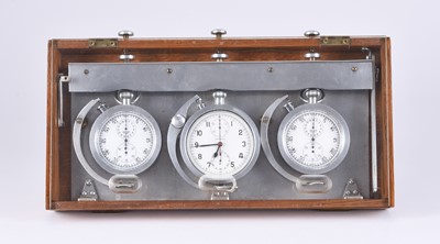 Lot 365 - A set of Heuer and Lemania sporting event chronographs and three pocket watches