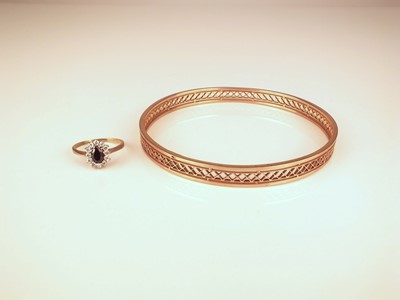 Lot 133 - A bangle and a ring