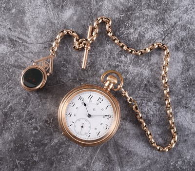 Lot 363 - An Eaton gold plated open face pocket watch together with a 10ct gold Albert and fob