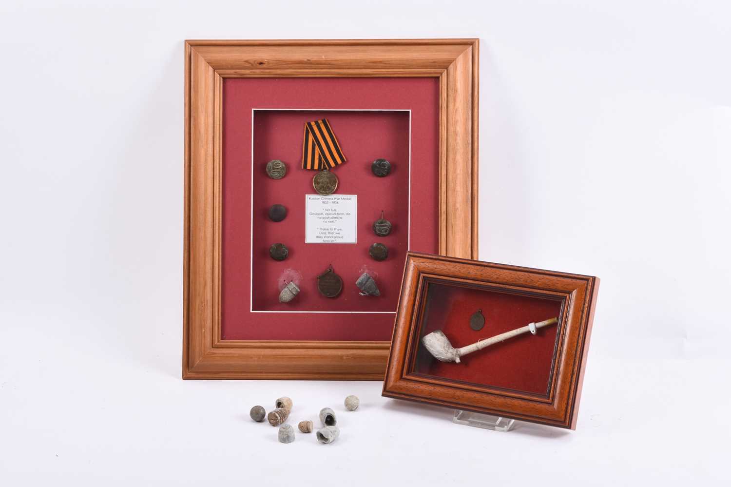 Lot 96 - CRIMEAN WAR - Two Russian medals, with buttons and bullets recovered from Sevastopol